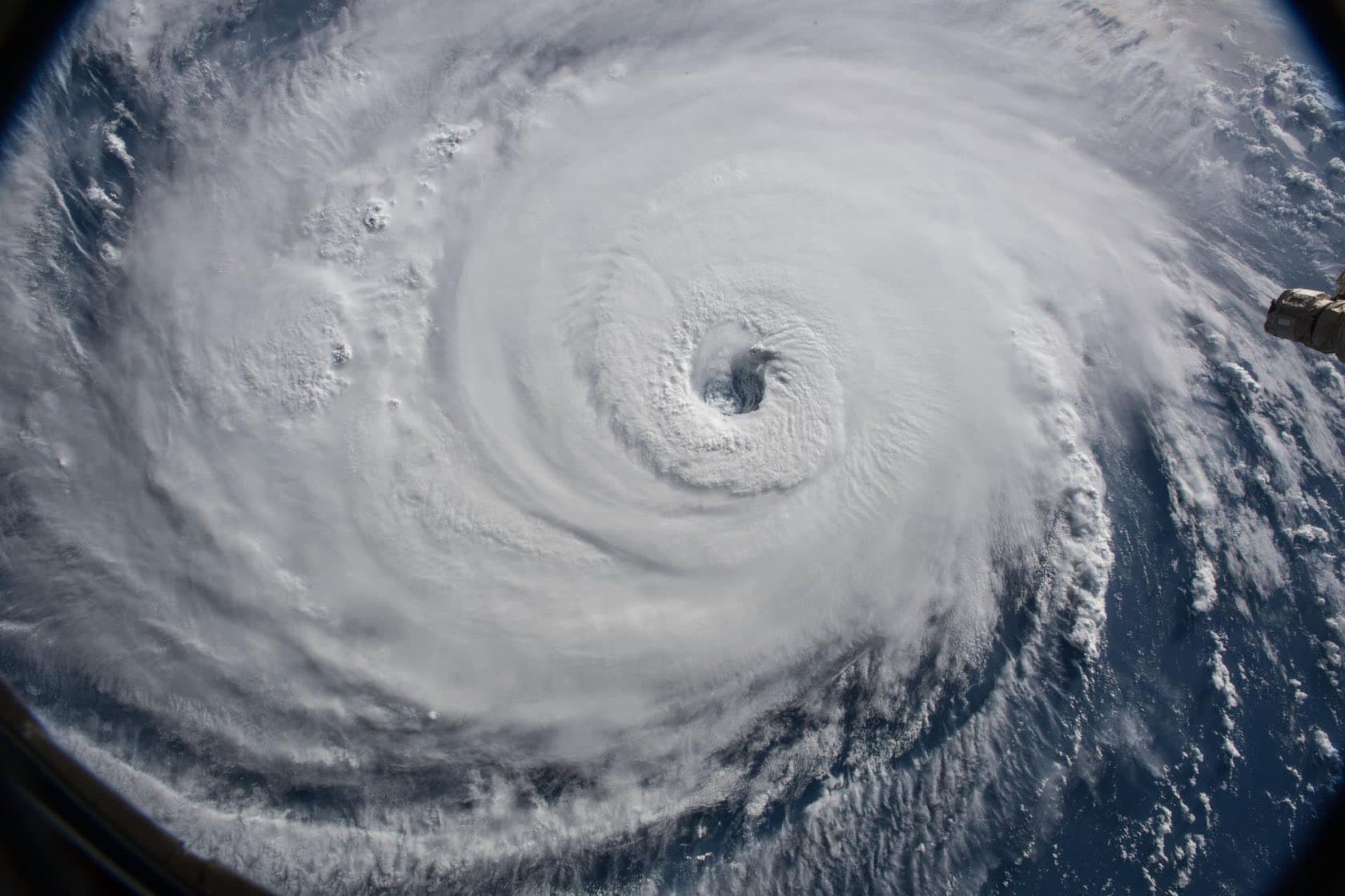 Hurricane Florence photographed from the International Space Station, a massive white spiral with a clear eye over the Atlantic
